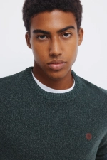 Однотонний светр із фактурної крученої пряжі