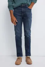 Джинсы Slim Fit темно-средней потертости