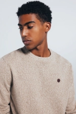 Однотонний светр із фактурної крученої пряжі