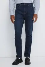 Джинсы Slim Fit с эффектом потертости