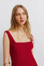 Коротка лляна сукня на бретелях