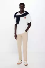 Легкие цветные брюки кроя Slim fit с 5 карманами