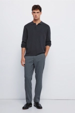 Штани з фактурної тканини крою slim fit