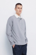 Однотонне поло з довгим рукавом