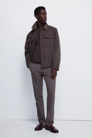 Штани з фактурної тканини крою slim fit