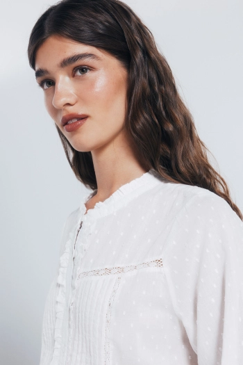 Блуза з об'ємним рукавом