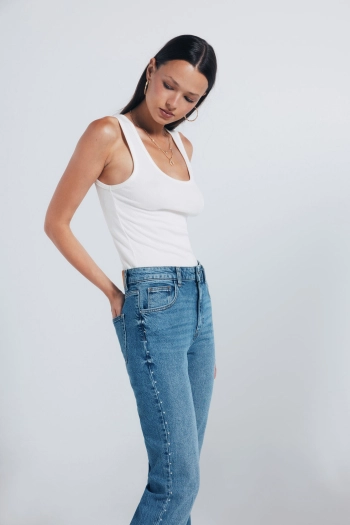 Прямі джинси з металевими заклепками