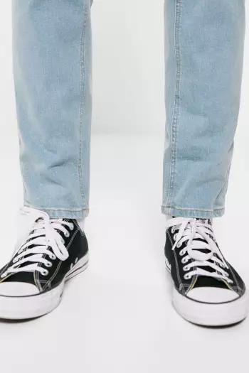 Джинси slim fit із ефектом потертостей