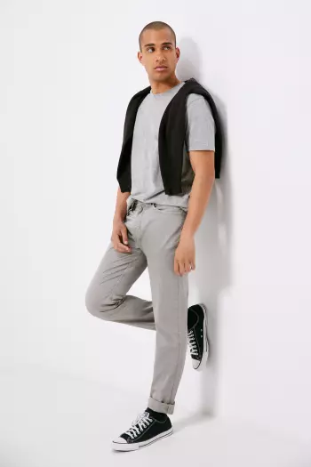Легкі кольорові штани крою Slim fit із п'ятьма кишенями