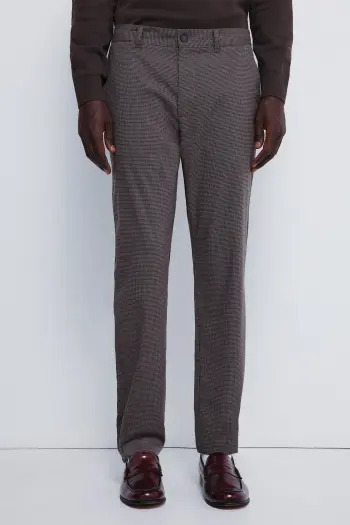 Штани з фактурної тканини крою slim fit