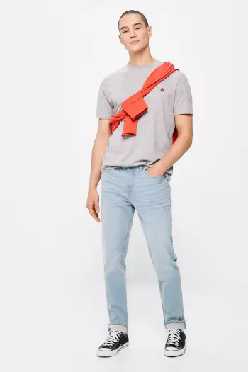 Джинси slim fit із ефектом потертостей