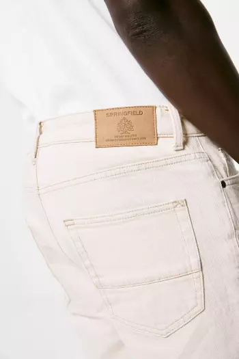 Джинсы slim fit с эффектом потертостей