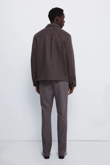 Штани з фактурної тканини крою slim fit