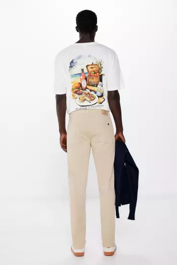 Легкі кольорові штани крою Slim fit з 5 кишенями