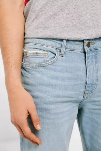 Джинси slim fit із ефектом потертостей