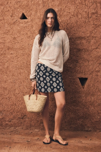 Коротка лляна спідниця з етнічним принтом