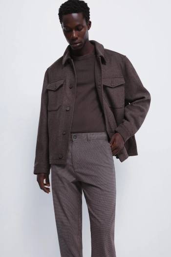 Штани з фактурної тканини крою slim fit