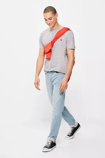 Джинси slim fit із ефектом потертостей