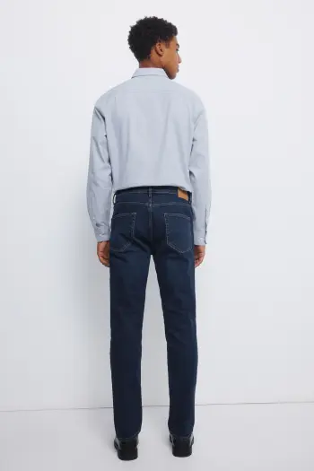 Джинси Slim Fit з ефектом потертості