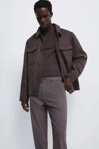 Штани з фактурної тканини крою slim fit