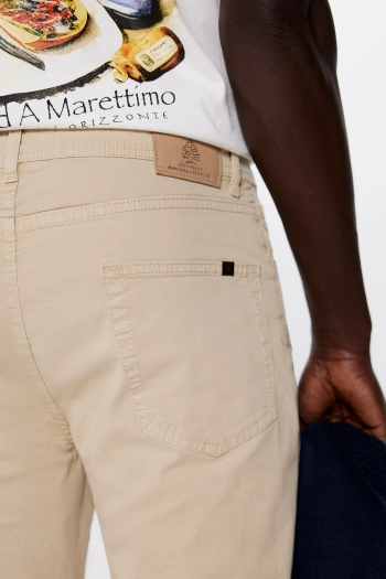 Легкі кольорові штани крою Slim fit з 5 кишенями