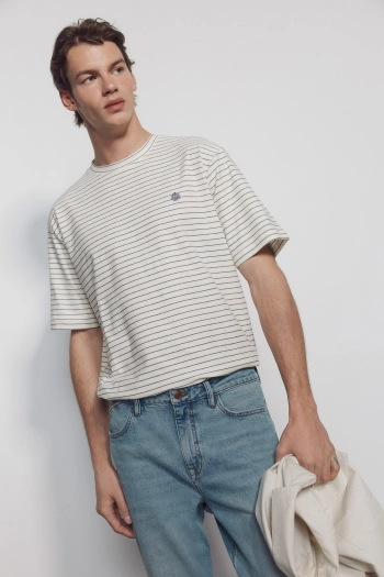 Джинси вузького крою з ефектом додаткового фарбування