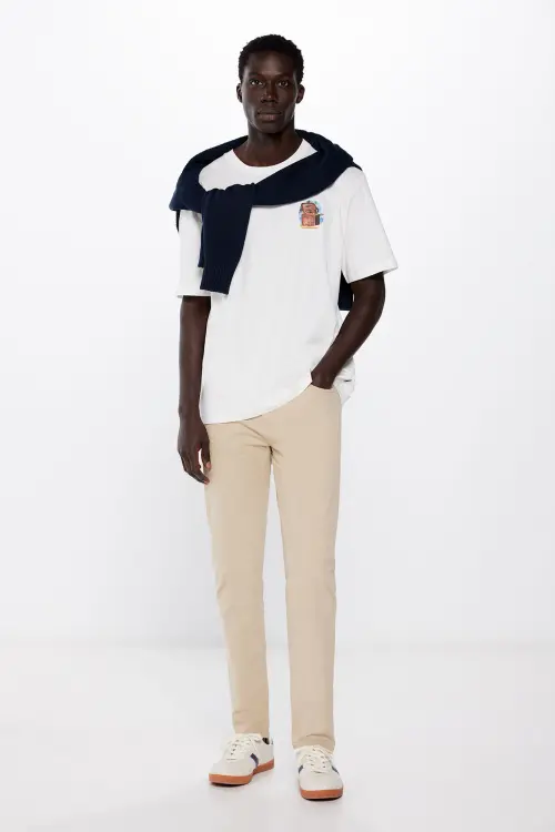 Легкі кольорові штани крою Slim fit з 5 кишенями