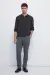 Штани з фактурної тканини крою slim fit